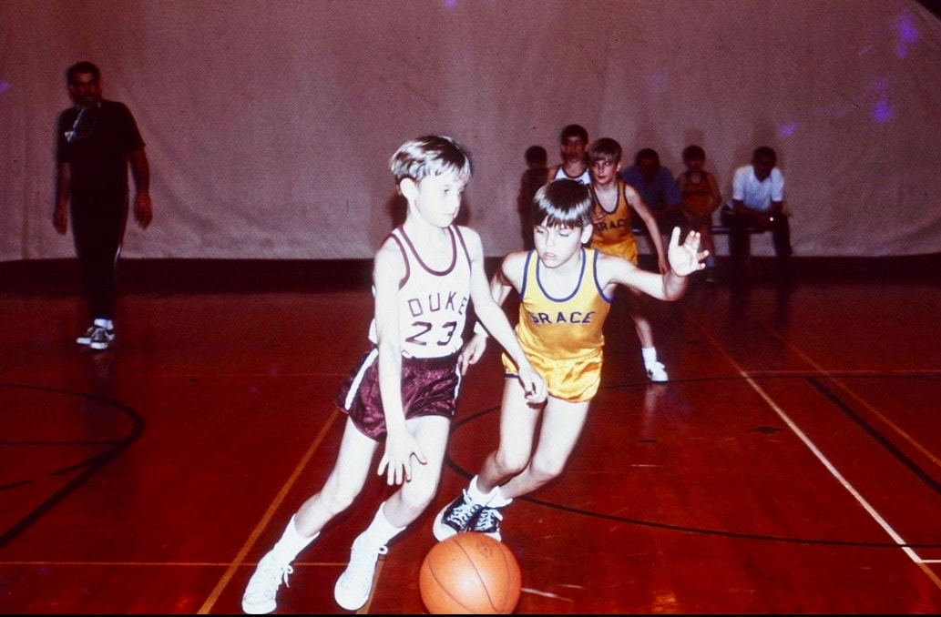 Photo of  Louie Sasser playing basketball in the early 70’s.